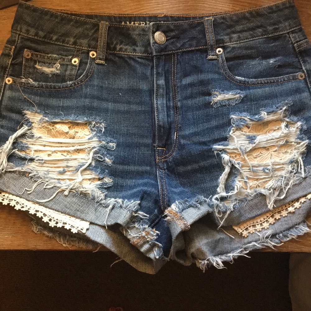 Never worn, distressed shorts